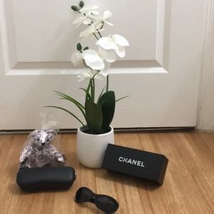 Authentic Chanel Sunglasses in a mint condition .